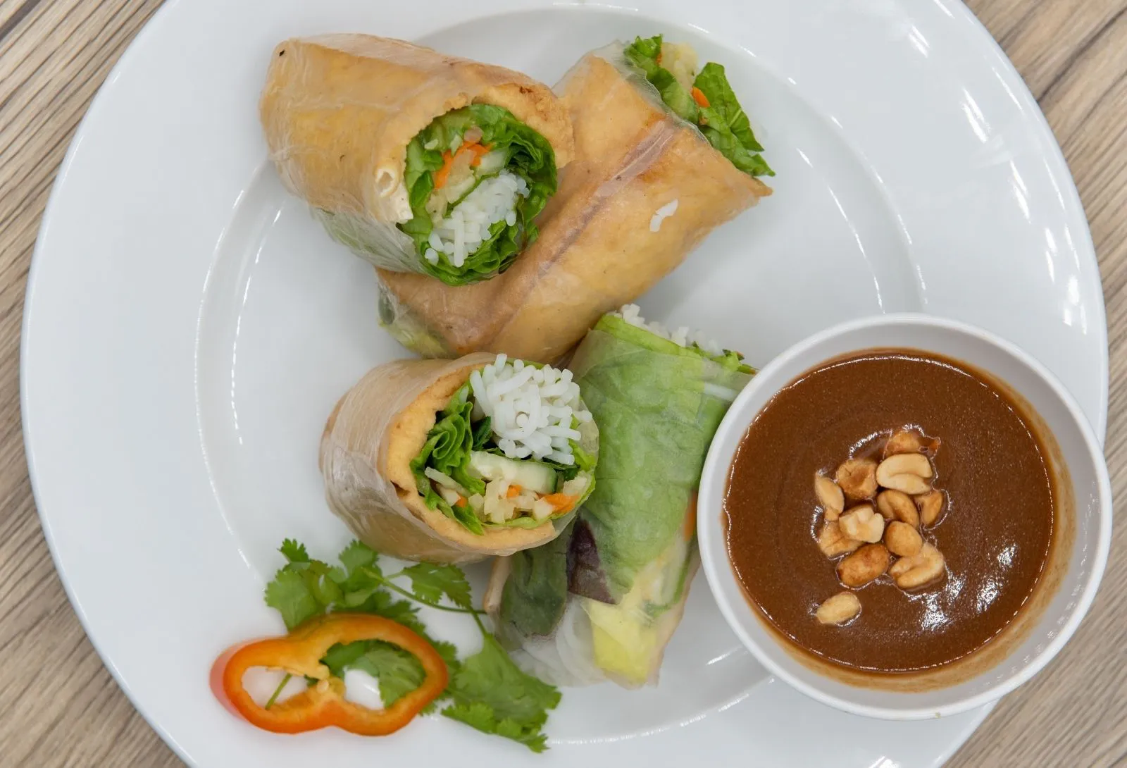 Vegetarian spring rolls with peanut dipping sauce at Miss Saigon, a Vietnamese Restaurant in Centreville